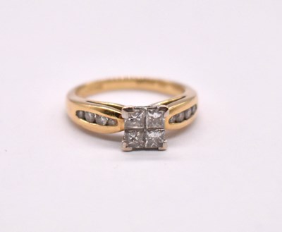 Lot 1116 - An 18ct yellow gold diamond cluster ring, the...