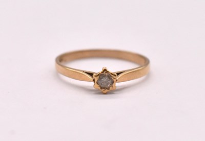 Lot 1125 - An 18ct yellow gold diamond solitaire ring,...
