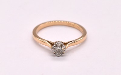 Lot 1127 - An 18ct yellow gold platinum tipped eight claw...