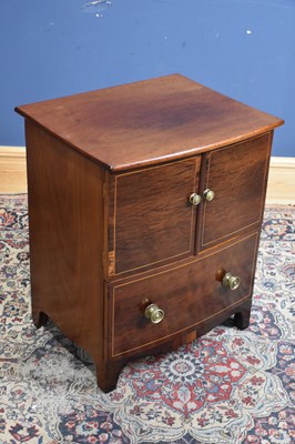 Lot 131 - A 19th century inlaid mahogany two door...