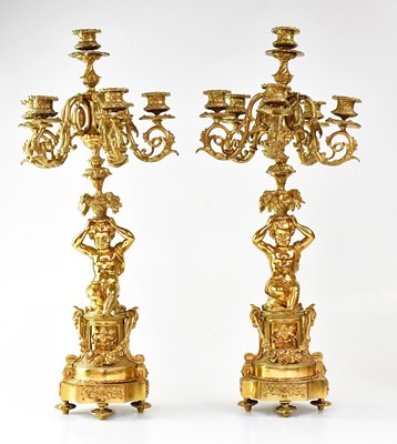 Lot 96 - A pair of late 19th century gilt brass figural...