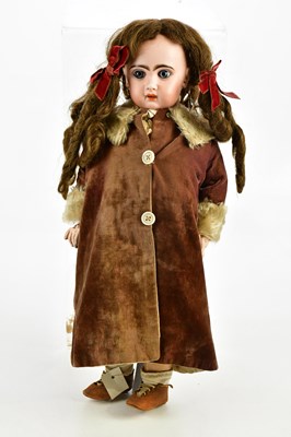 Lot 3 - JUMEAU; a large bisque headed doll, with...