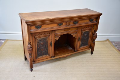 Lot 1037 - A Victorian carved walnut sideboard, with two...