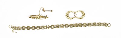 Lot 309 - A 9ct yellow gold gate link bracelet, a seed...