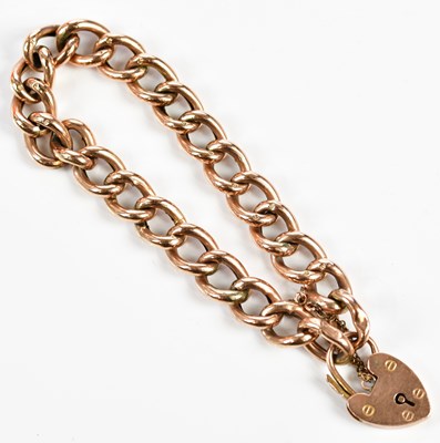 Lot 293 - A 9ct rose gold hollow curb link bracelet with...