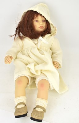 Lot 728 - A modern collectors' doll with cloth body,...