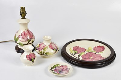 Lot 1280 - MOORCROFT; five pieces decorated in the...