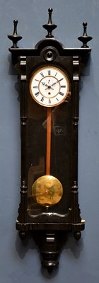 Lot 2044 - A late 19th century ebonised Vienna wall clock,...