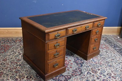 Lot 66 - An early 20th century oak twin pedestal...