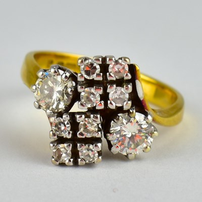 Lot 700 - An 18ct yellow gold bespoke ring, the top with...