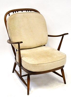 Lot 32 - ERCOL; a pair of dark elm stick back open...
