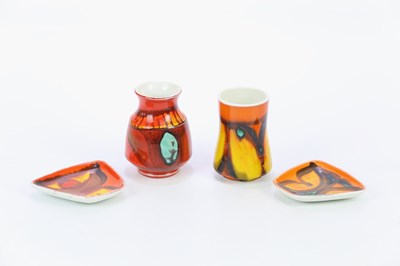 Lot 2347 - POOLE POTTERY; four pieces decorated in the...