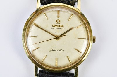 Lot 596 - OMEGA; a gentleman's vintage gold plated and...