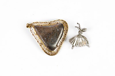Lot 398 - An abstract yellow metal framed brooch of...