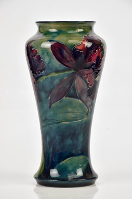 Lot 2206 - WILLIAM MOORCROFT; a vase of tapering form in '...