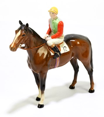 Lot 572 - BESWICK; a model of jockey on horseback,...