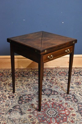 Lot 68 - An Edwardian mahogany envelope card table,...