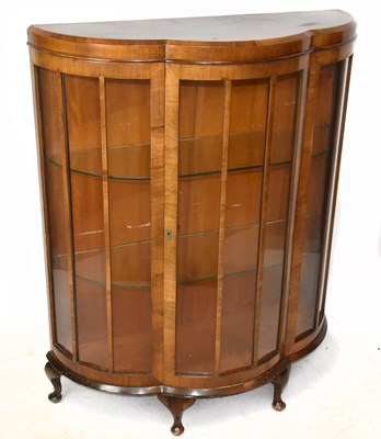 Lot 1641 - An Art Deco walnut bowfront display cabinet,...
