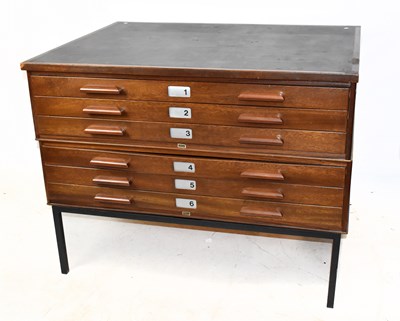 Lot 1750 - ABBESS; a teak six drawer plan chest on black...