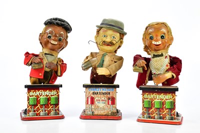 Lot 2628 - Three vintage tinplate battery operated...