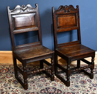 Lot 1169 - A pair of oak back stools, circa 1700, with...
