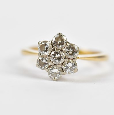 Lot 93 - An 18ct yellow gold seven stone diamond set...