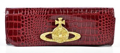 Lot 751 - VIVIENNE WESTWOOD; a red embossed crocodile...