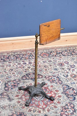 Lot 63 - A Victorian adjustable reading table with cast...