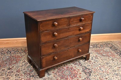 Lot 99 - A Victorian mahogany two short over three long...