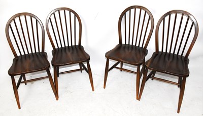 Lot 1729 - A set of four reproduction comb back kitchen...