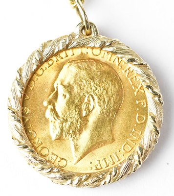 Lot 770 - A George V sovereign, 1915, in a 9ct yellow...