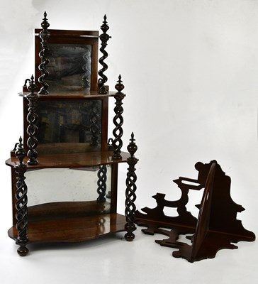Lot 119 - A 19th century rosewood three tier wall shelf,...