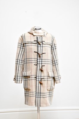 Lot 885 - BURBERRY; a 100% wool beige, black and red...