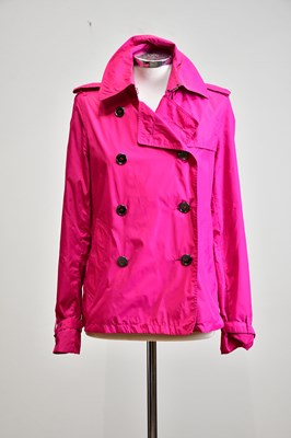 Lot 888 - BURBERRY; a short double breasted fuchsia pink...