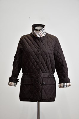 Lot 893 - BURBERRY; a brown cotton lady's quilted short...