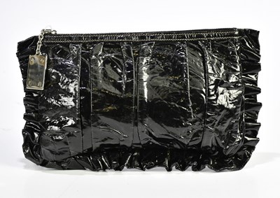 Lot 793 - DOLCE & GABANNA; a black patent leather clutch...