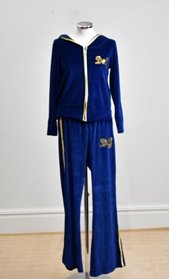 Lot 911 - DOLCE & GABANNA; a blue velour two piece...