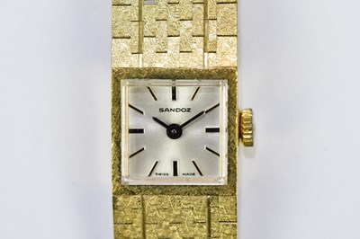 Lot 602 - SANDOZ; a 9ct three tone gold wristwatch with...