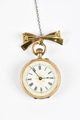 Lot 662 - A 14ct yellow gold crown wind open face fob...