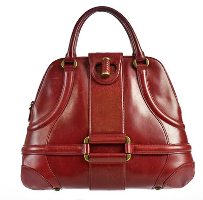 Lot 710 - ALEXANDER MCQUEEN; a red leather Novak handbag,...