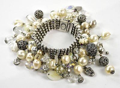Lot 921 - ASKEW, LONDON; a silver tone five strand ball...