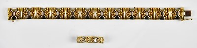 Lot 269 - A 9ct two tone gold bracelet, length 18cm, and...