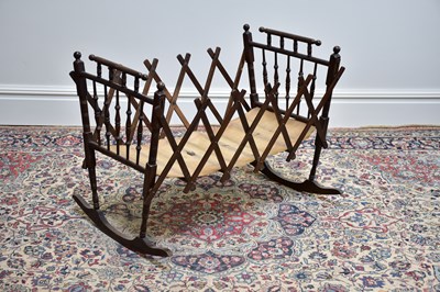 Lot 1036 - A late 19th century campaign folding crib.