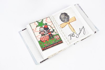 Lot 1724 - A postcard album containing a selection of...