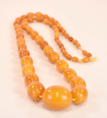 Lot 1267 - A vintage hand tied graduated egg...