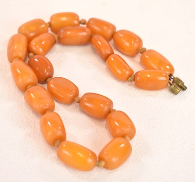 Lot 1274 - A vintage hand tied egg yolk/butterscotch...