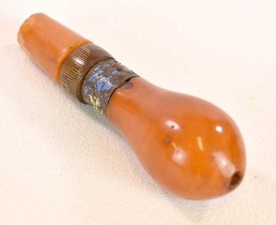 Lot 1281 - A late 19th century amber walking cane handle...