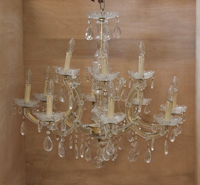 Lot 1550 - A cut glass electrolier with eight lower...