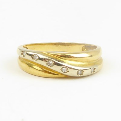 Lot 716 - A 9ct yellow gold ring set single diagonal...