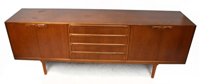 Lot 1702 - MCINTOSH; a mid-century teak sideboard, with...